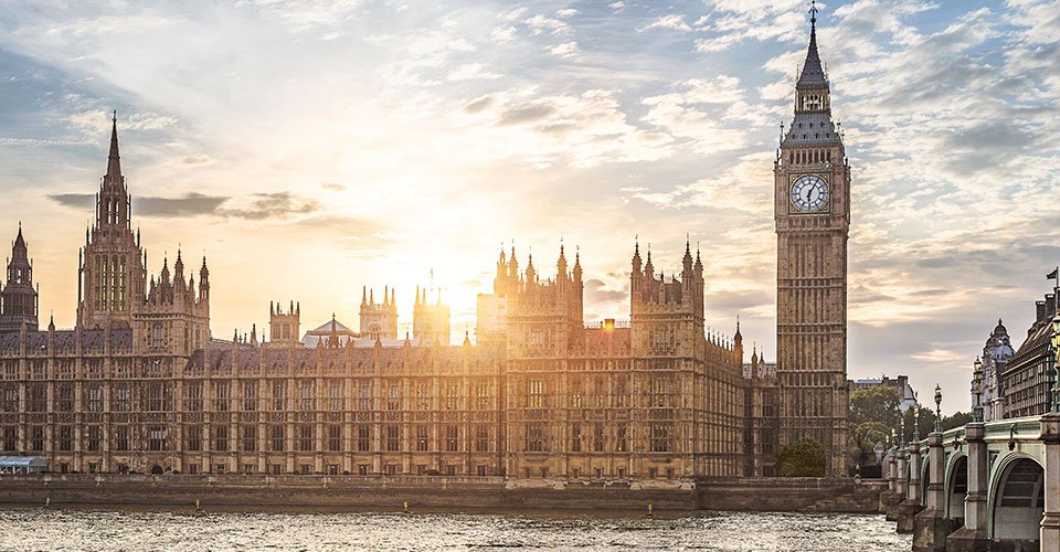 Sun setting over Houses of Parliament, London, United Kingdom
