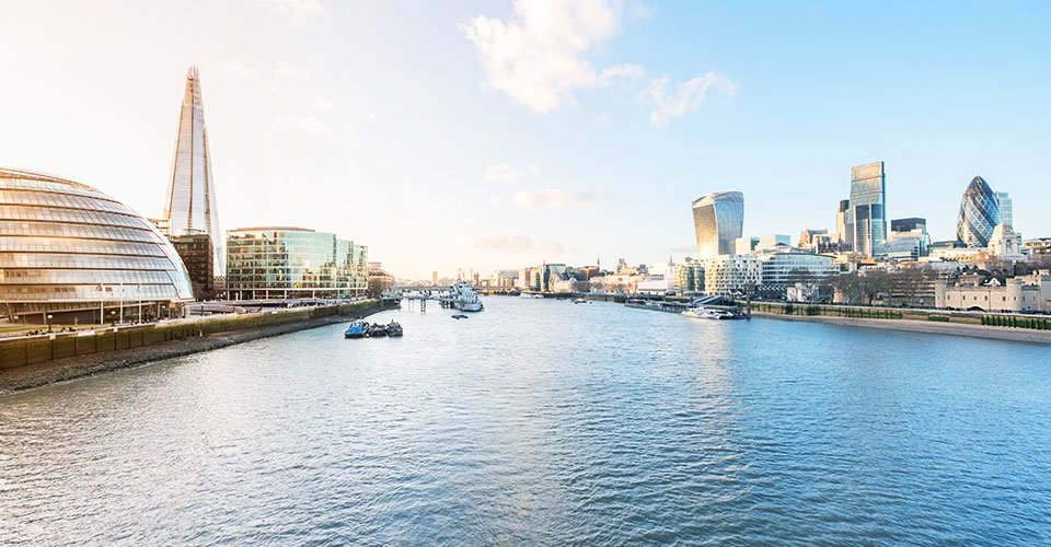 A cityscape of London, England, including the More London Development.