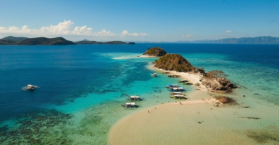 Aerial view beautiful beach on a tropical Bulog Dos Island. Philippines.