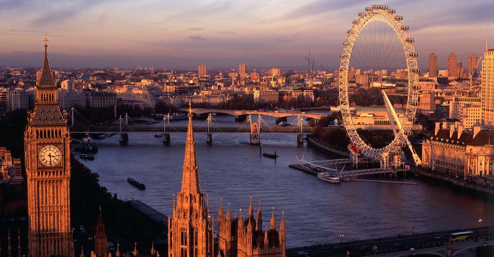 View from the top of the Victoria Tower, the lesser known of the two towers of the Houses of Parliament, towards Big Ben, the River Thames and the London Eye