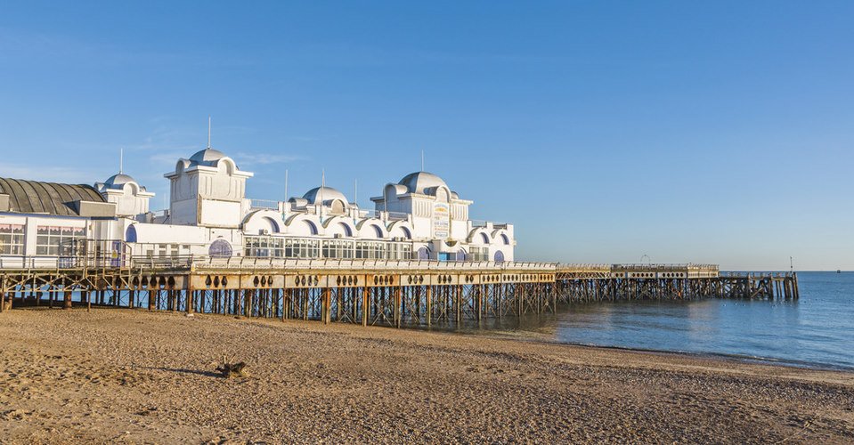 South Parade Pier, Southsea, Hampshire, UK, stony pebble beach