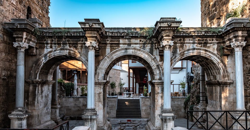 Uckapilar, Antalya / Turkey - June 2019: Ruins of Hadrian's Gate, Hadrian's Gate is popular place for traveller