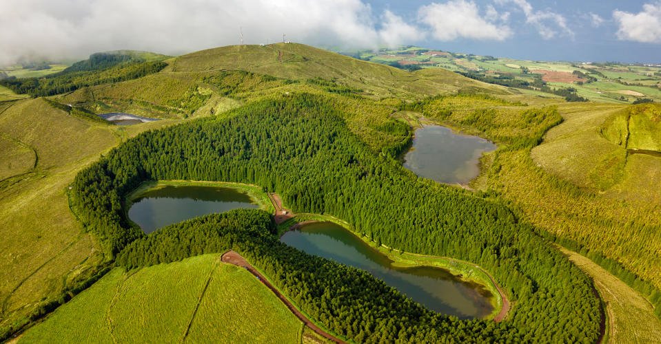 Azores, the safest European holiday destinations for post-pandemic travel. Drone aerial view of volcanic landscape. Sao Miguel island with amazing lagoons from above