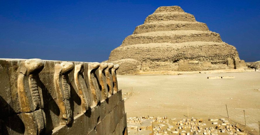 Cobra figures and the Step Pyramid of Djoser at Saqqara, Egypt