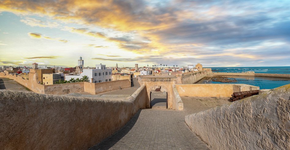 Panoramic view of Mazagan in El Jadida, Morocco at sunset. The City Wall around  the old city. It is a Portuguese Fortified Port City registered as a UNESCO World Heritage Site. Panorama.