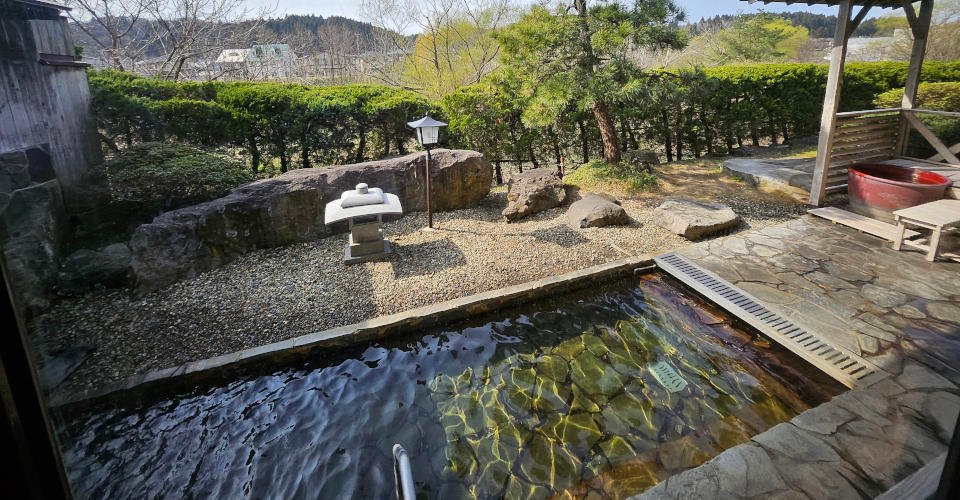 Am Abend Baden im Arima Onsen