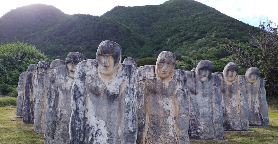 January 2021, Martinique, FWI: Monument to the shipwrecked slaves of l'anse caffard, French West Indies Caribbean. Commemorative sculpted white statues on the island of Martinique.