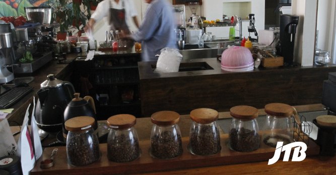 TOUR OPERATOR GATEWAY - Charming Coffee Bar with Freshly Roasted Beans Displayed in Glass Jars