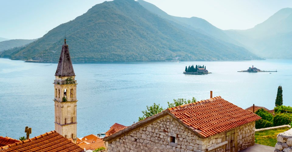 Panorama of Kotor Bay seen from upper Perast. On the right famous islands: Ostrvo Sveti ?or?e (Island of Saint George) and man made island Gospa od ?krpjela (Our Lady of the Rocks)