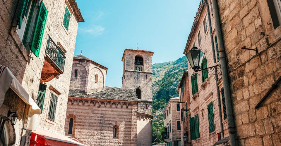 Old historical buildings in the central district of ancient city Kotor in Montenegro.