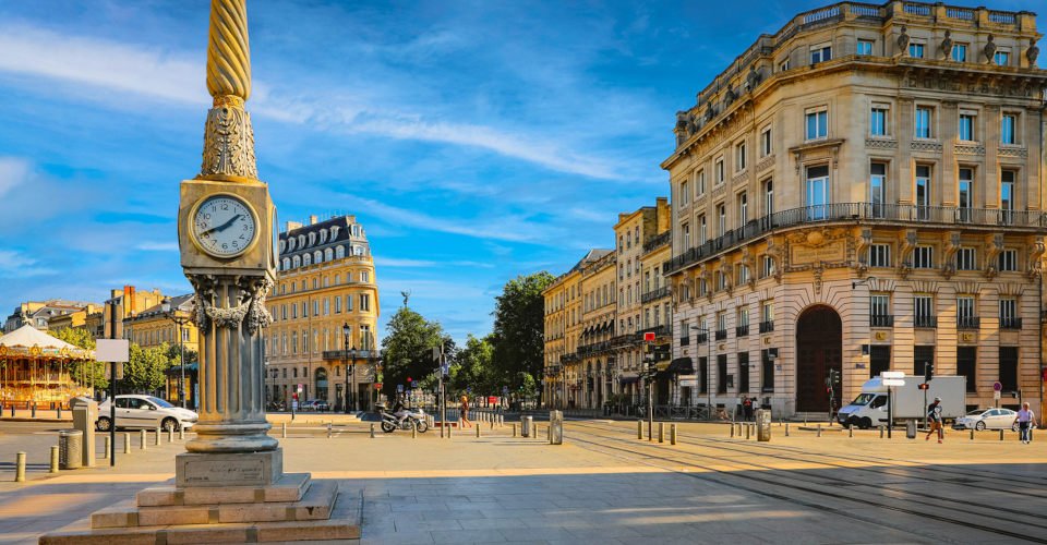 Bordeaux, France - May 31, 2019: Street view of old city in Bordeaux, France, typical  buildings from the region, part of unesco world heritage