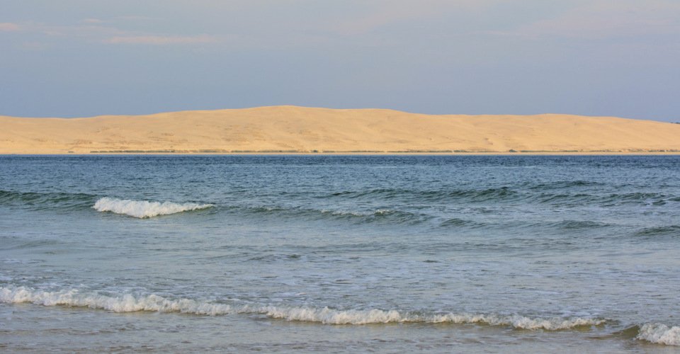 A front view of the famous Dune of Pilat, the highest dune in Europe, from the Banc of Arguin, in Cap Ferret.