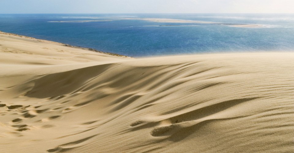 "On the top of Europe's highest dune, at the french atlantic coast near the town Arcachon. South west france, gulf of Biscaya ( Cote d'argent ). View out to the atlantic ocean with sandbanks."