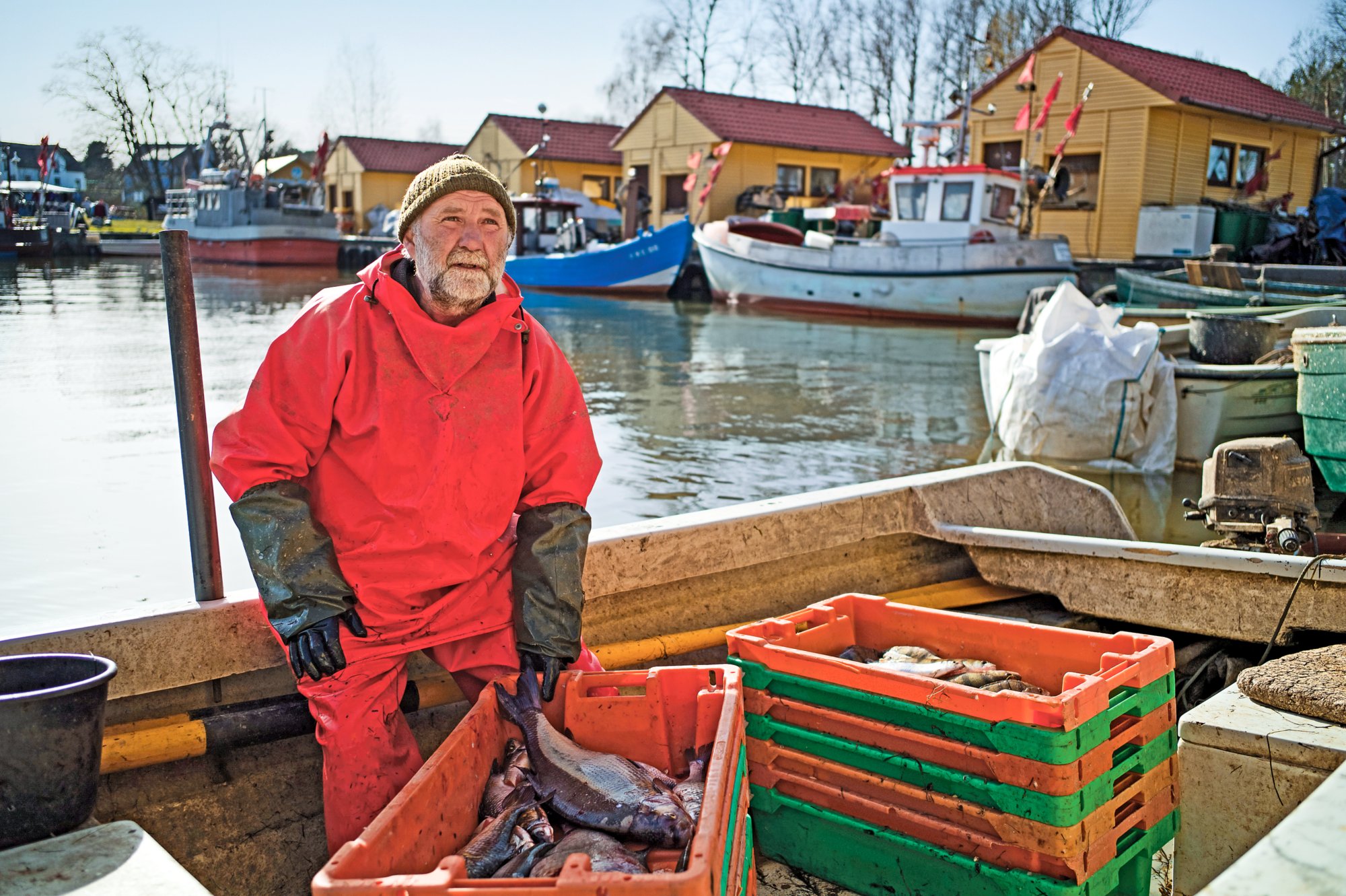 Fischer auf seinem Boot
