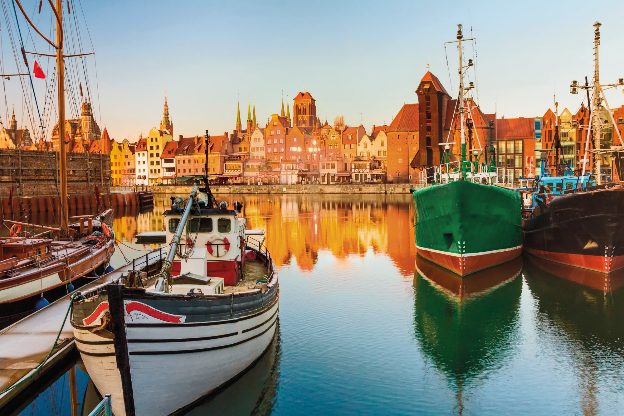 Morning scenery with boats of Gdansk old town in Poland