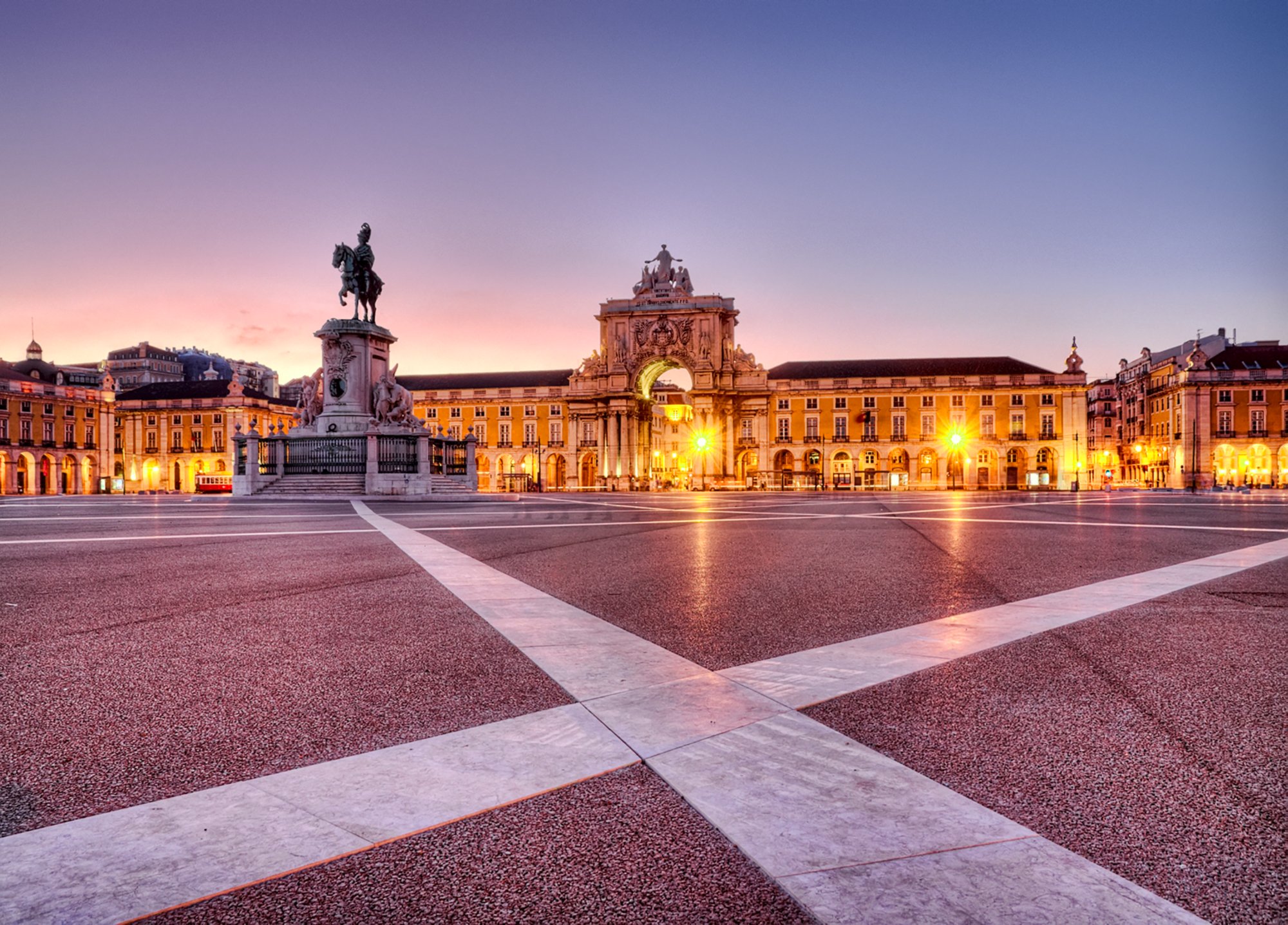 HDR image of the Praça do Comércio (Terreiro do Paço) in Lisbon, Portugal, at nightfall. Film and grain simulation on processing.