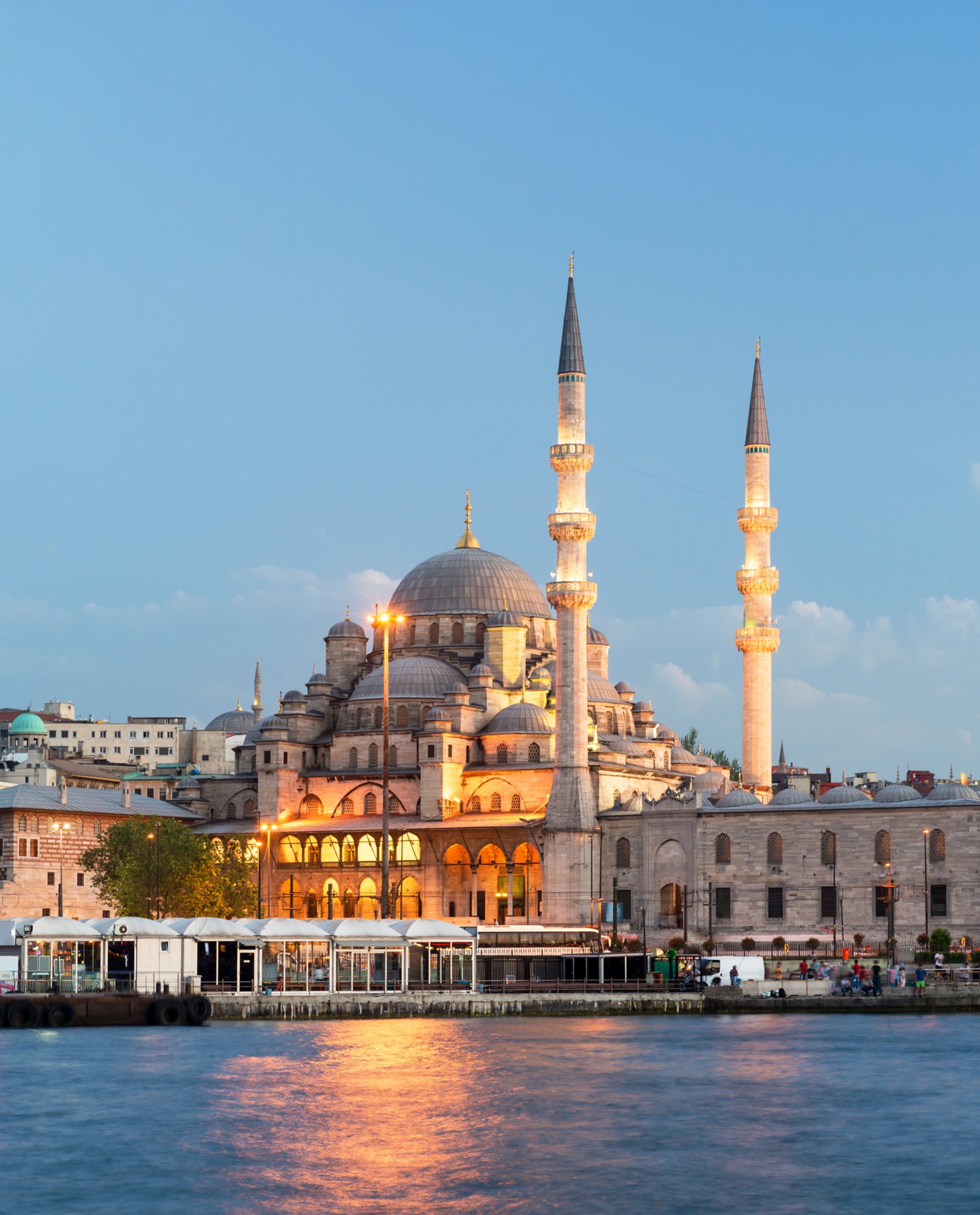 Mosque near the Galata Bridge at night in Istanbul, Turkey 