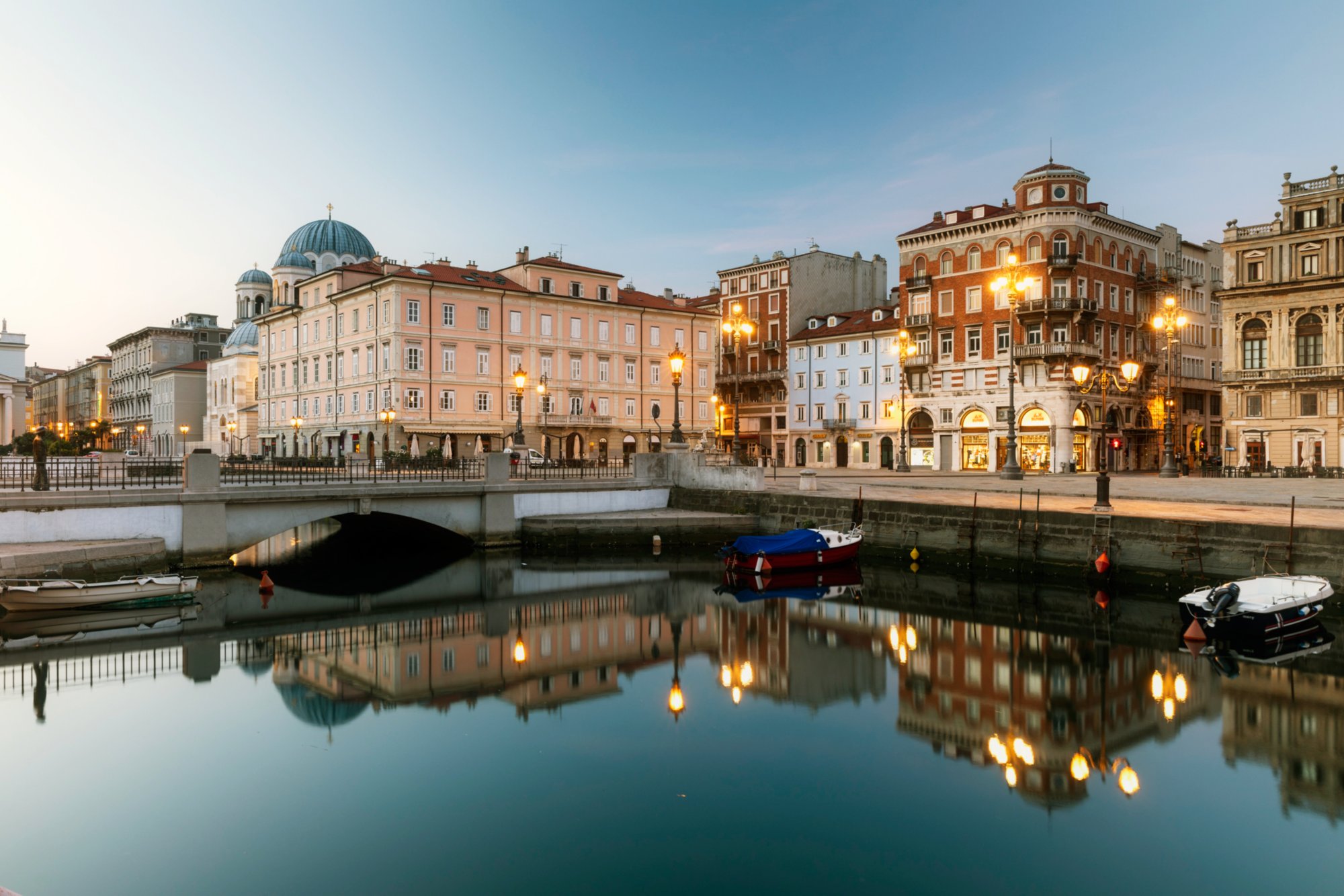 Sunrise over the center of Trieste, the grande canale