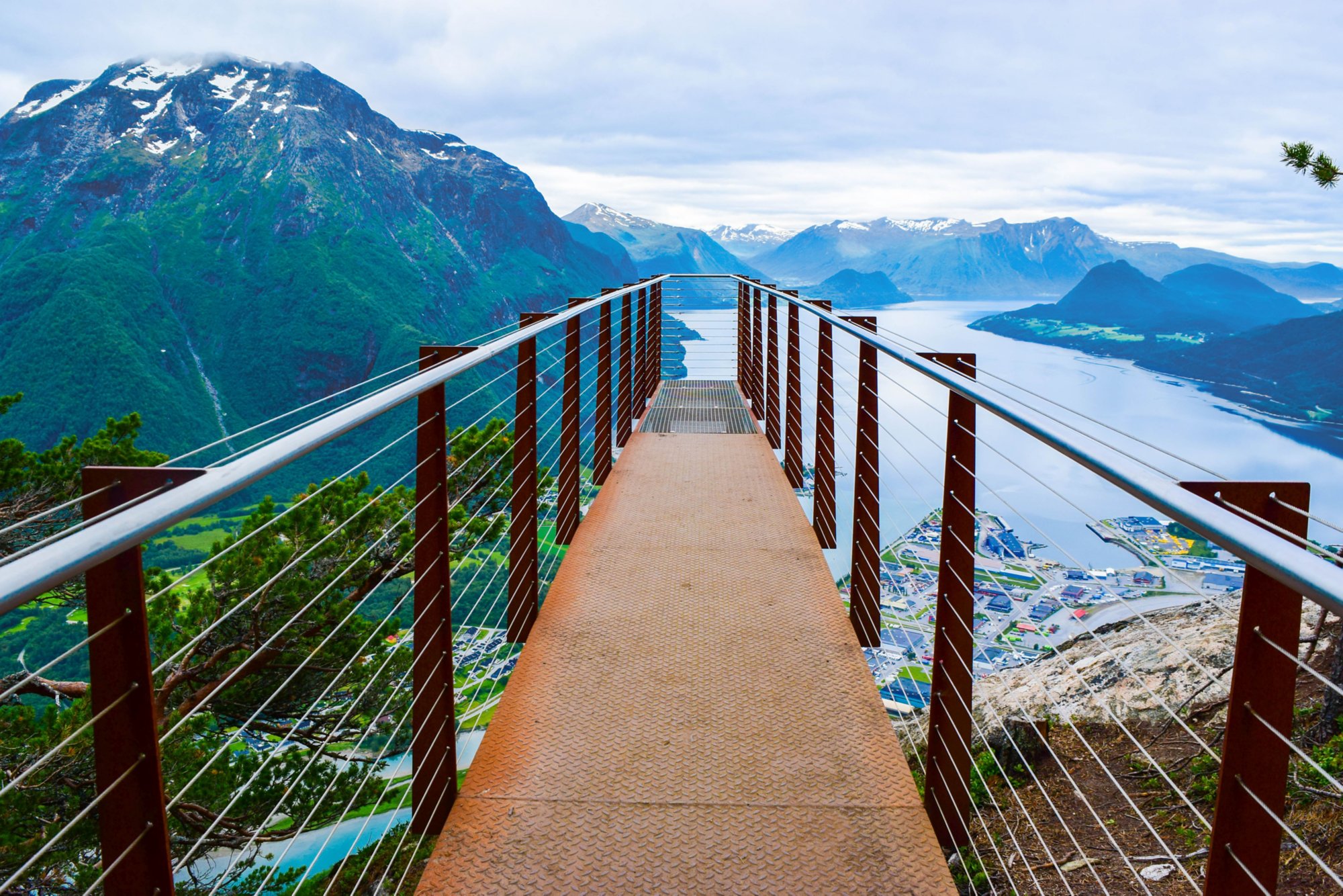 Rampestreken viewpoint. Panoramic nobody landscape to Romsdalen Valley and Andalsnes city located on shores of Romsdalsfjord (Romsdal Fjord), between picturesque mountains. Rauma Municipality, Norway.; Shutterstock ID 1855215202; purchase_order: 25906 at; job: ; client: AIDA Cruises; other: 