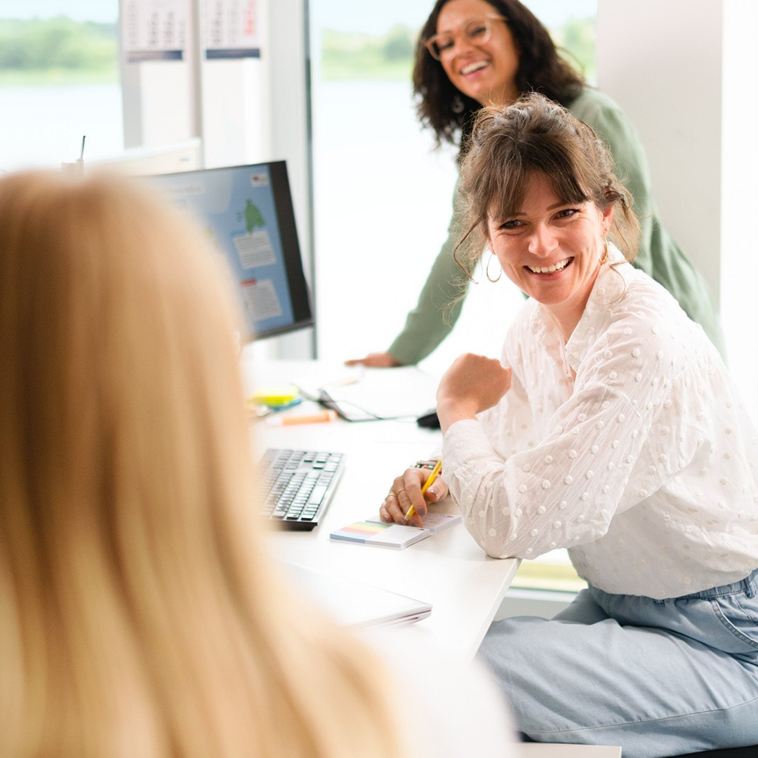 AIDA employees in the office
