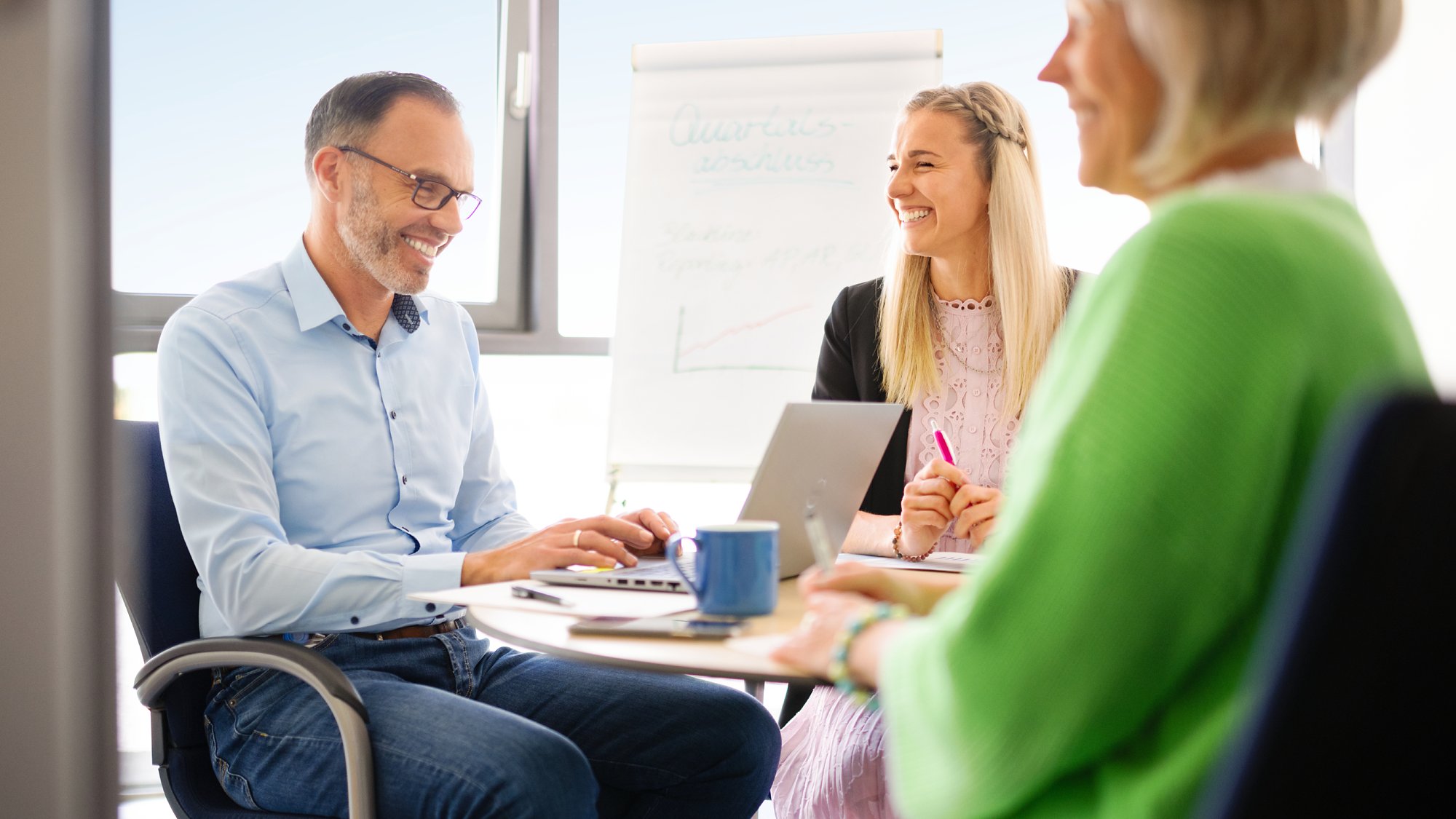 AIDA employees in a meeting