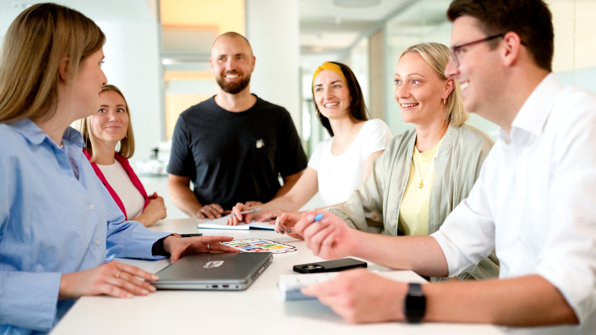 AIDA employees in a meeting