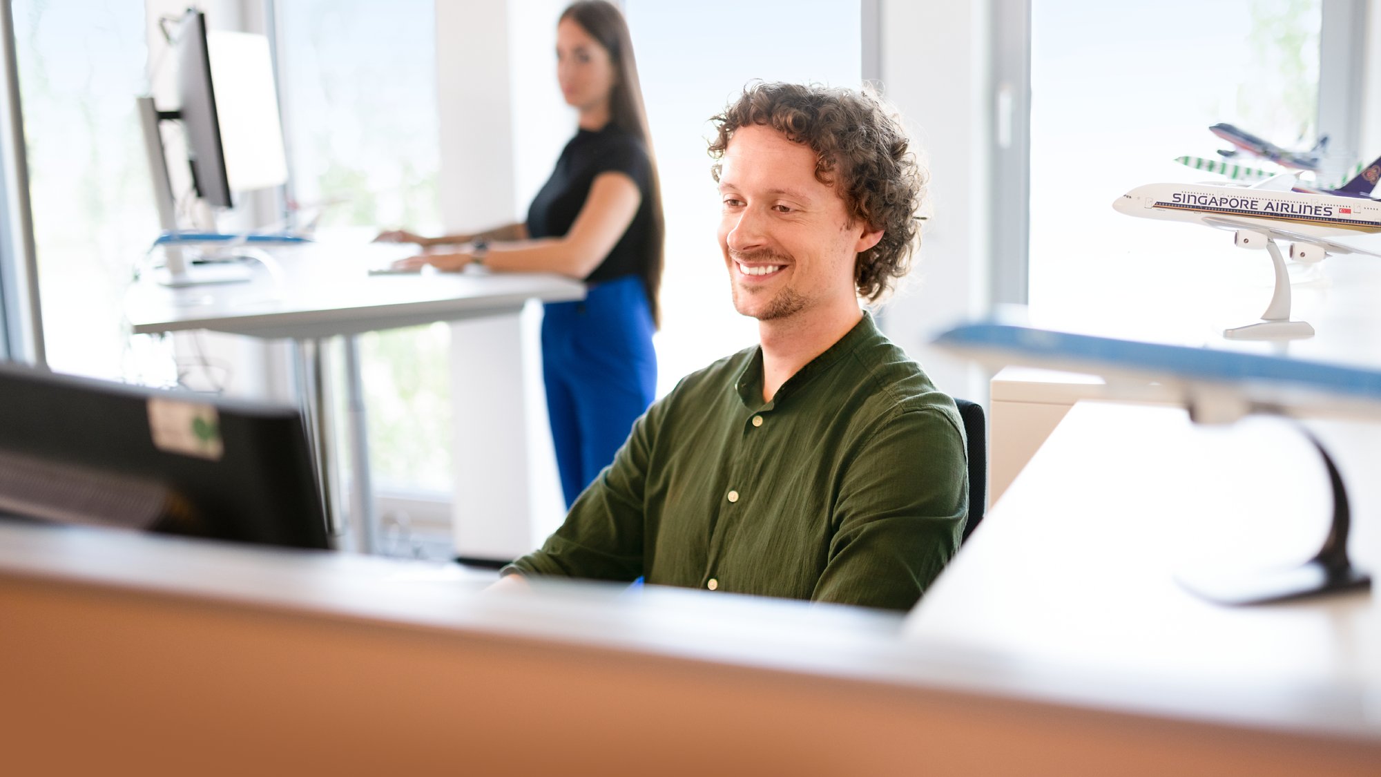 AIDA employee in the office