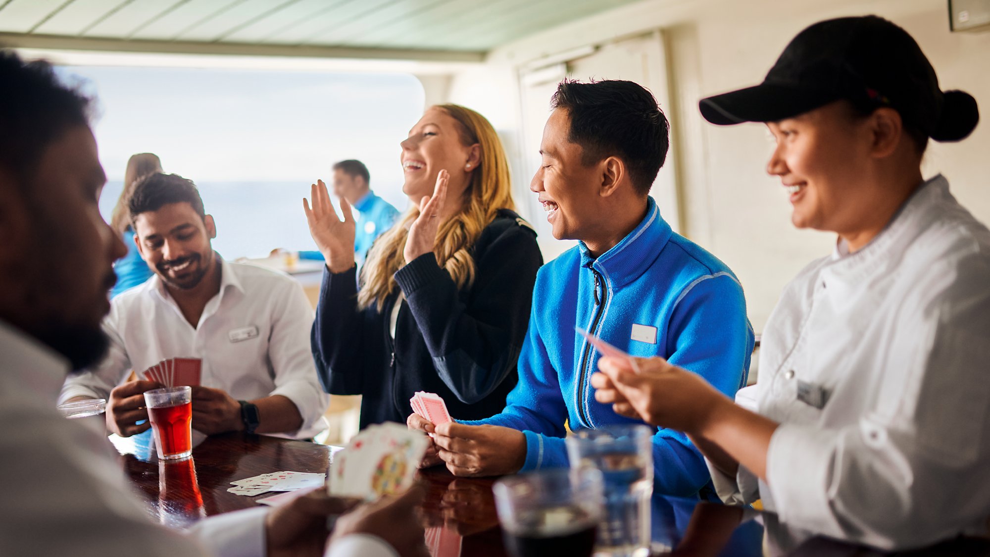 AIDA employees play cards on board