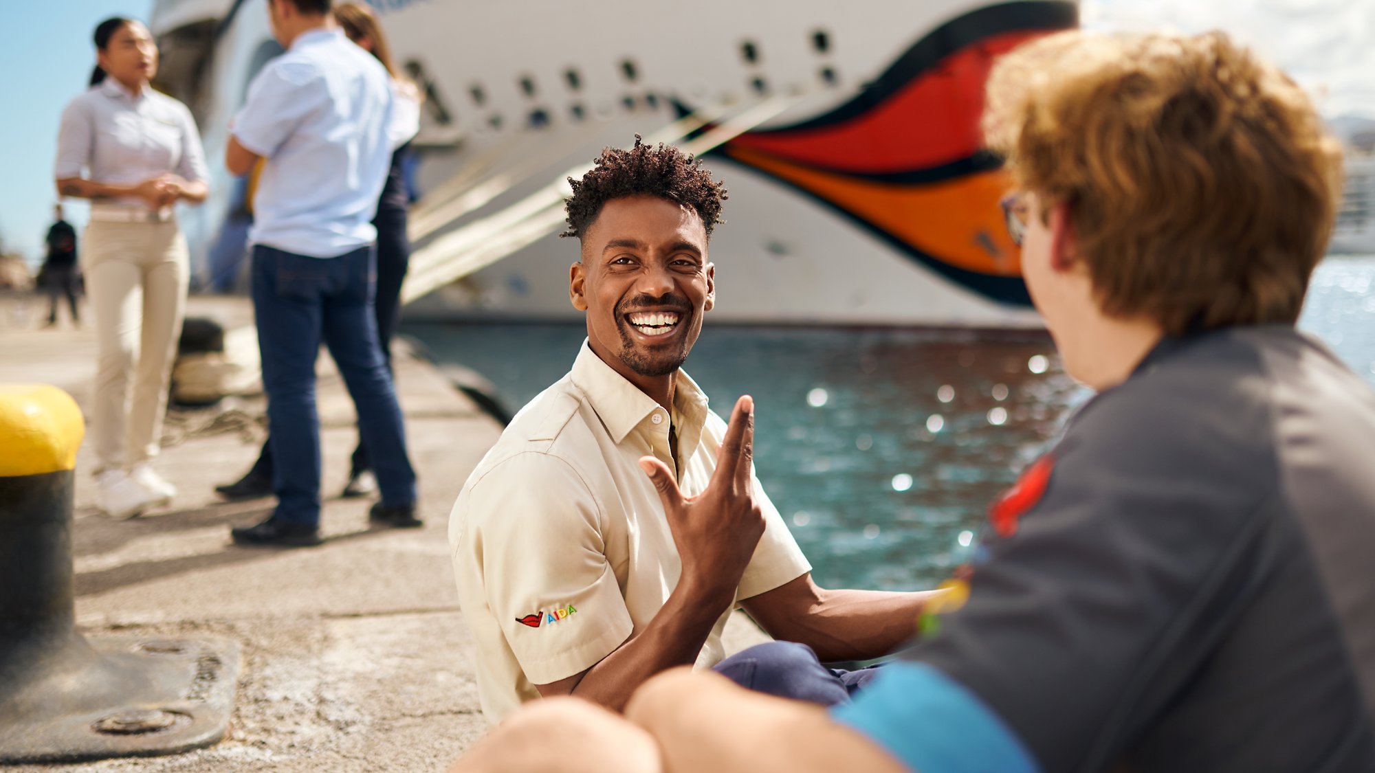 AIDA employees in front of AIDA ship