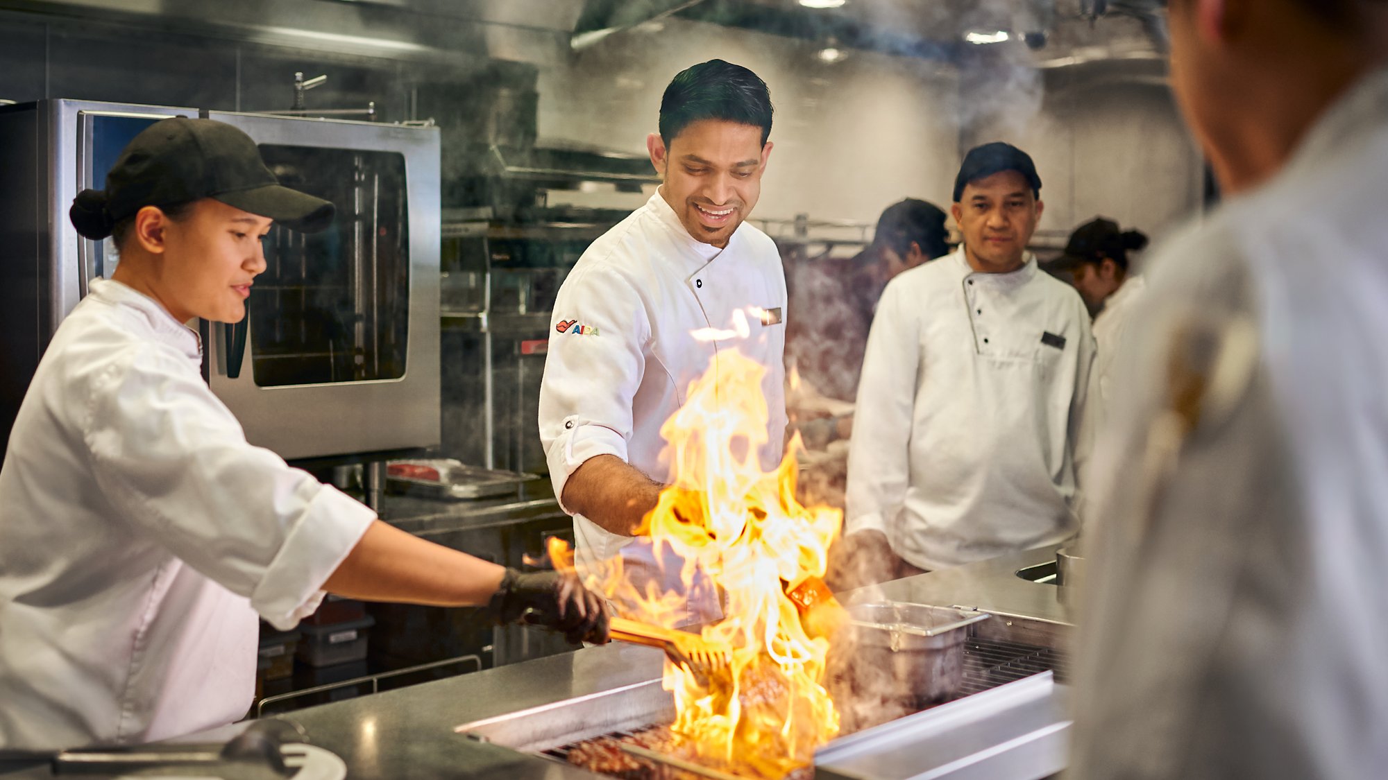 Chef de Chuisine boils in the galley