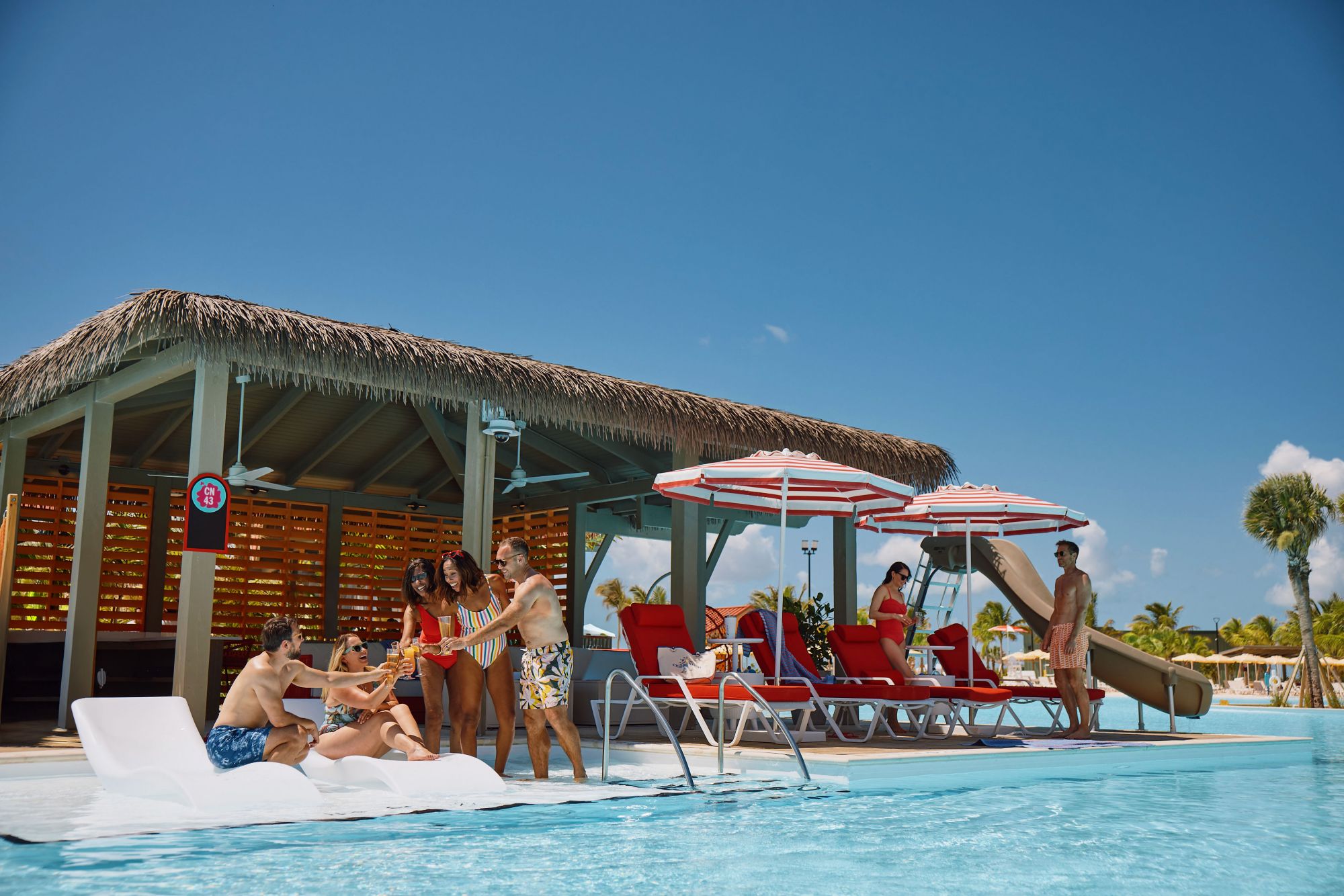 CELV31_OvertheLagoonSuperVilla_FRONTVIEW_FAMILYENJOYING.jpg