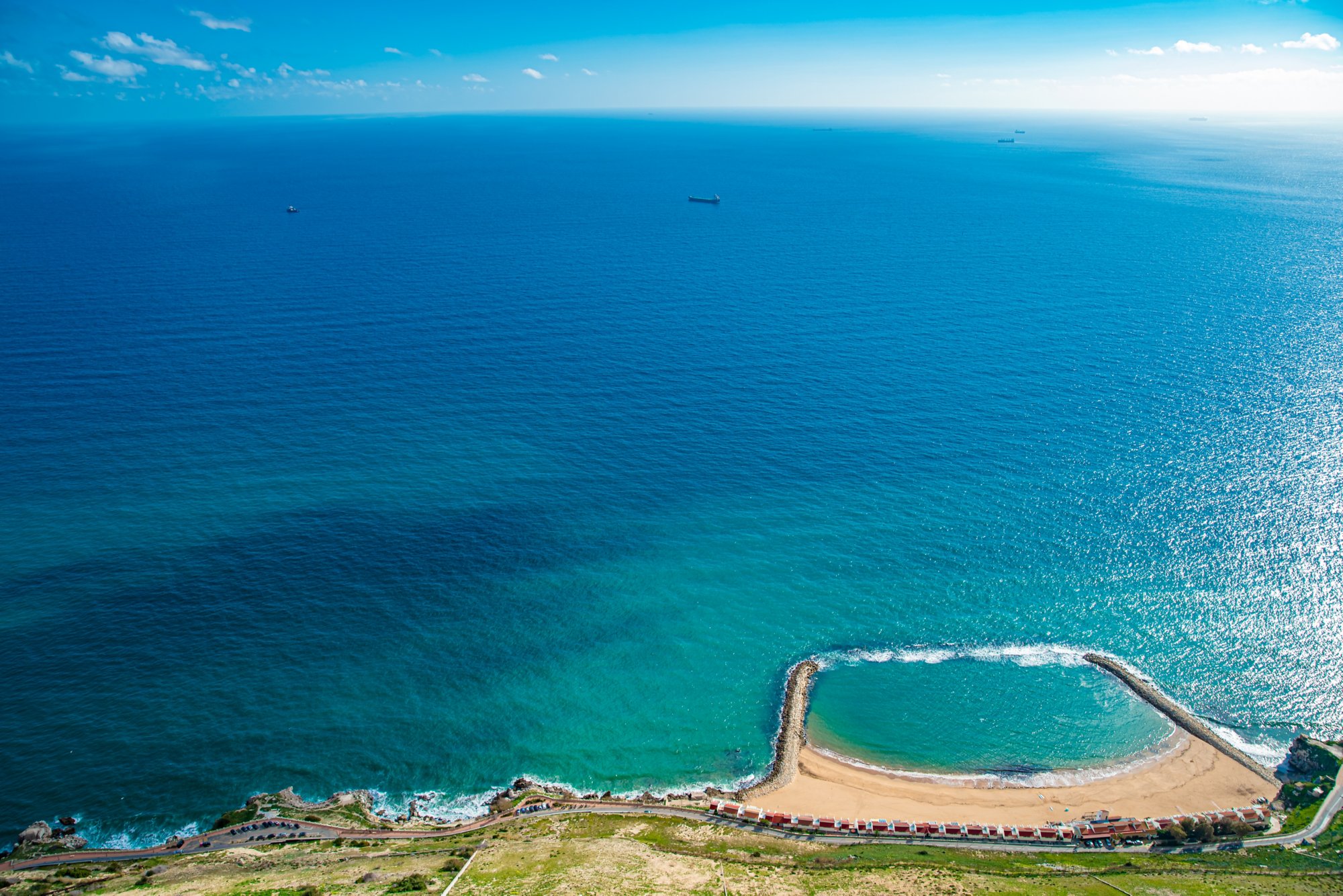 Blue lagoon with beach with bird's-eye perspective. ideal place for vacation and rest.