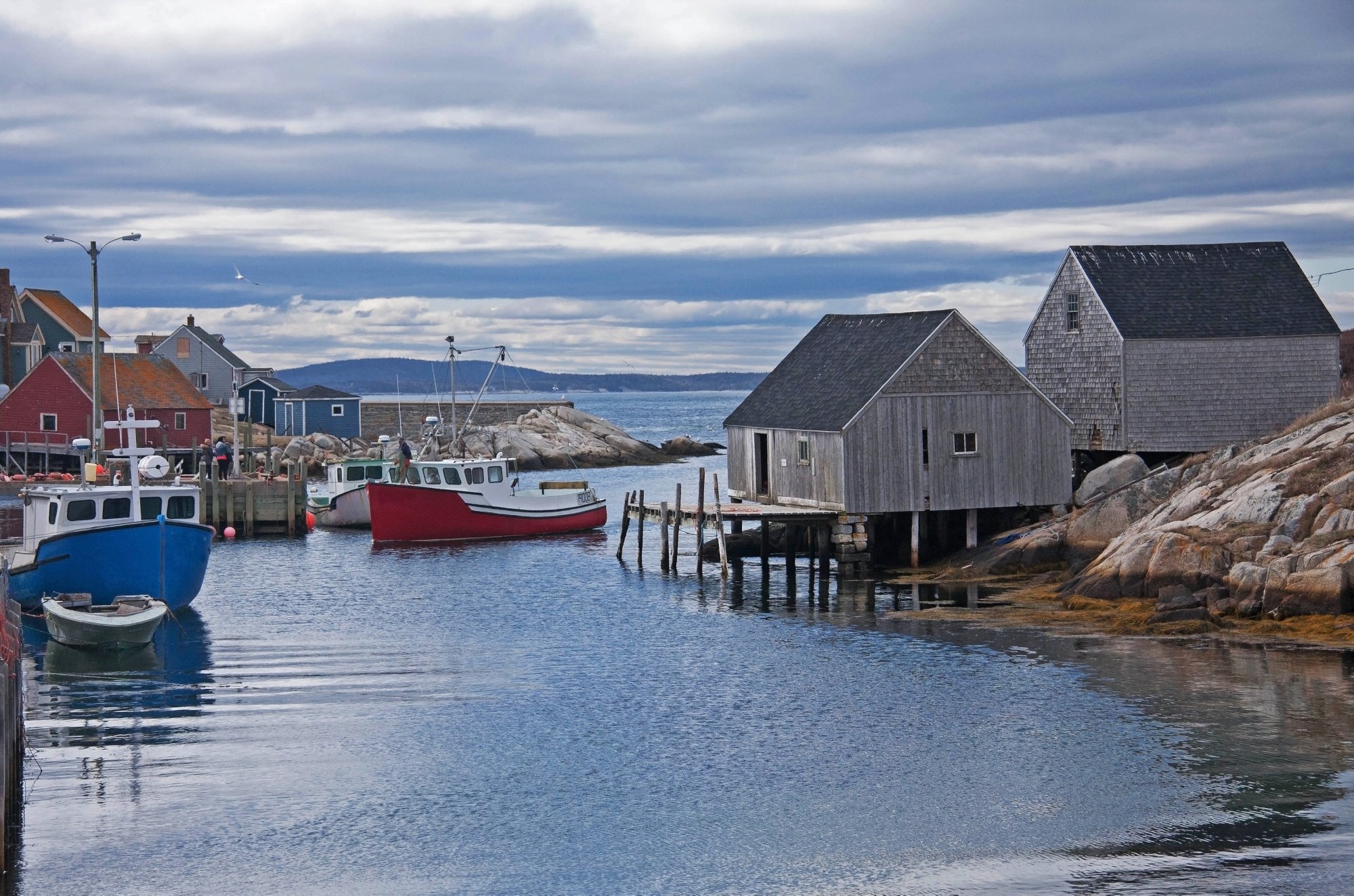 Peggy's Cove. A rustic fishing village in Nova Scotia, Canada with buildings from the 1800's. This picturesque town is a popular tourist destination near Halifax on the Atlantic Ocean.