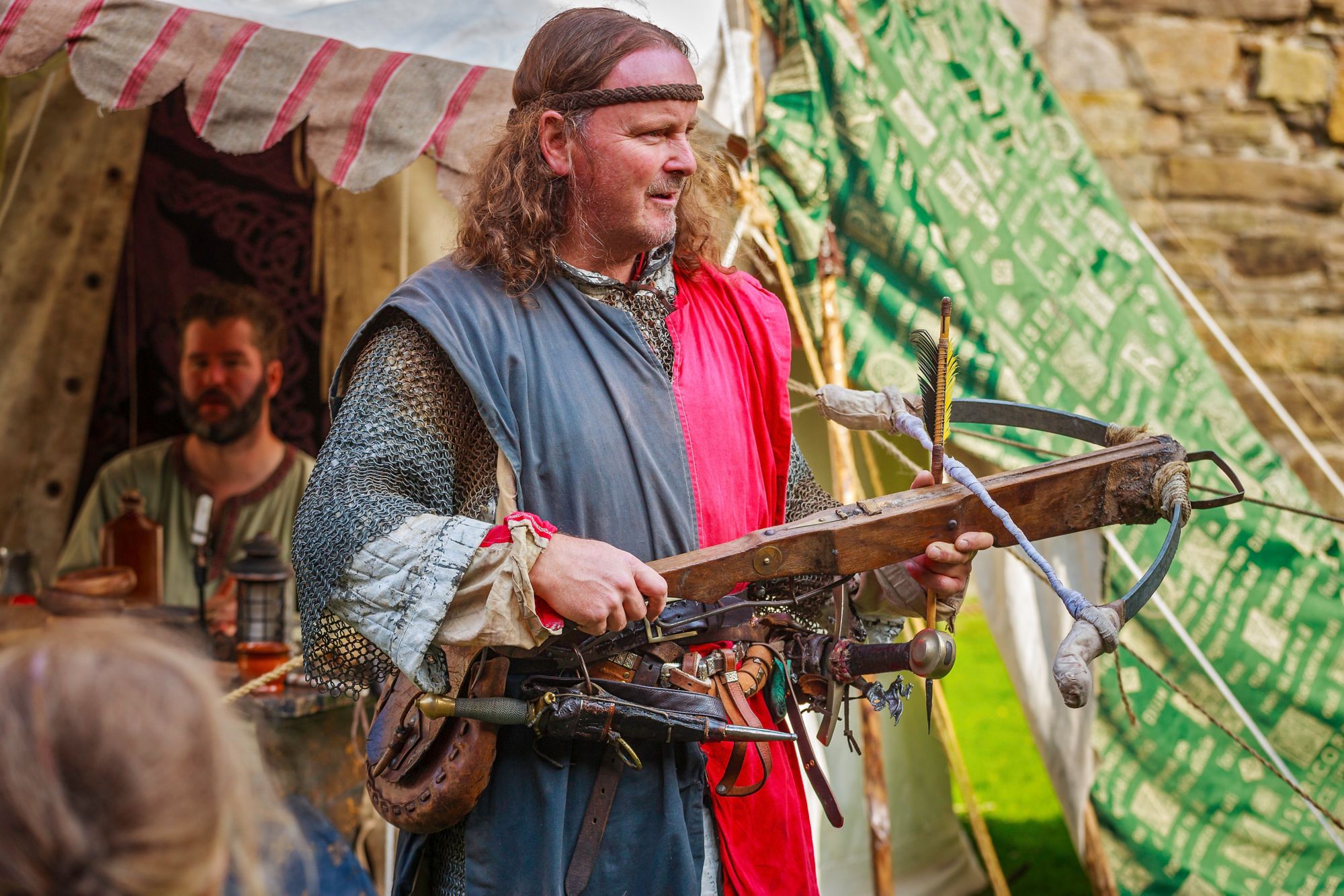 Re-enactor demonstrating a crossbowMedieval FestivalBeaumaris Castle Cadw SitesWorld Heritage SitesSAMN: AN001NGR: SH607762Isle of AngleseyNorthCastlesMedievalDefenceHistoric SitesEventsMarketing