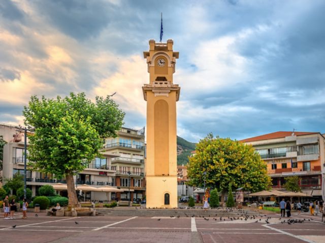 Xanthi, Greece - September 1 2024: The Clock tower of Xanthi, an Ottoman-era monument located in the central square of the town.