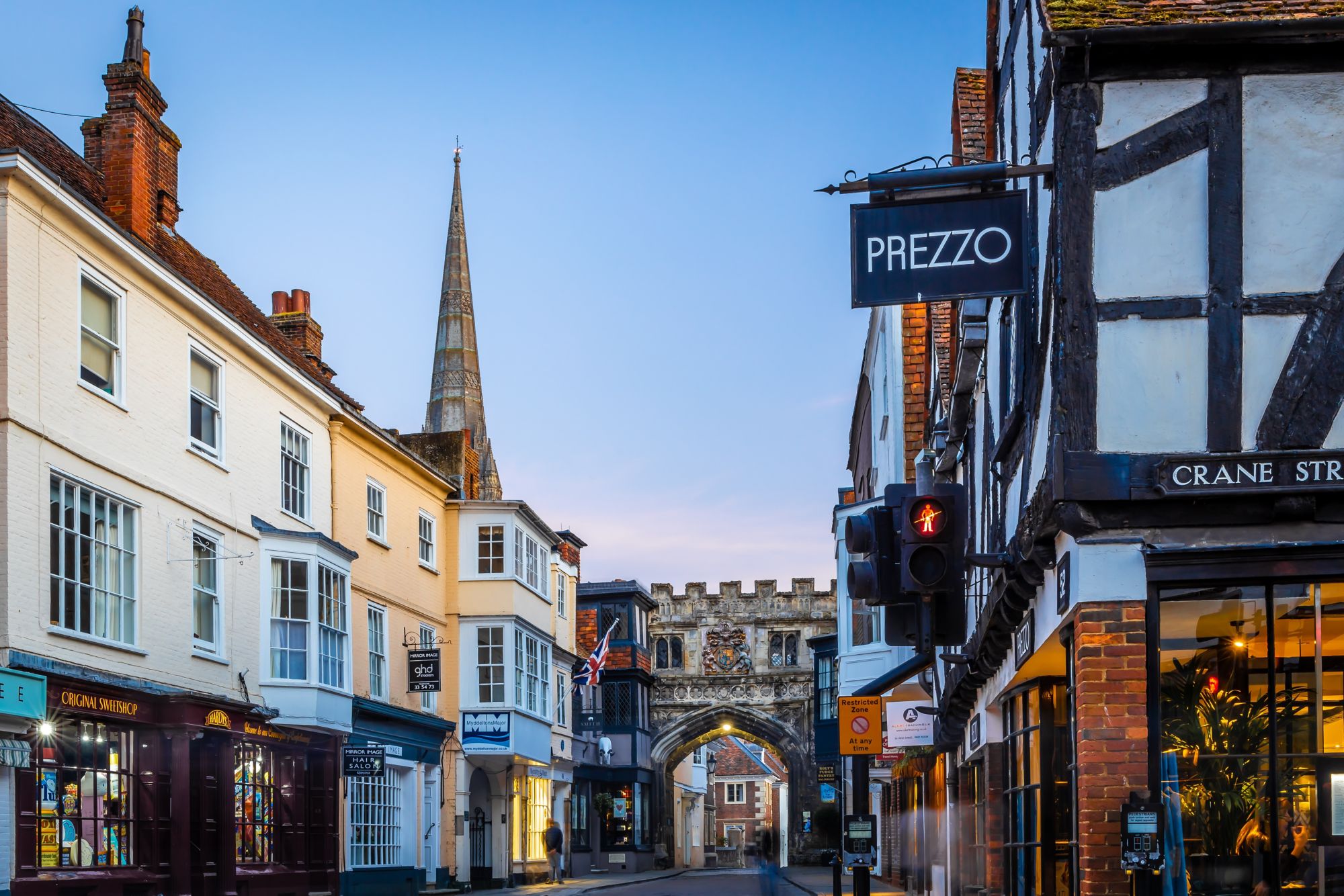 Aerial view of High street gate and Salisbury cathedral in the evening
