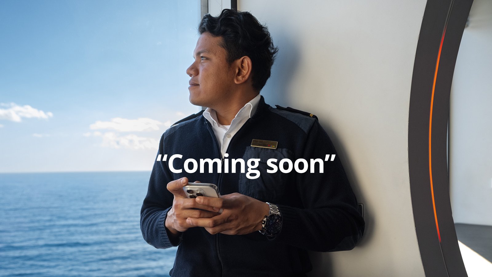 AIDA crew member looks at the sea