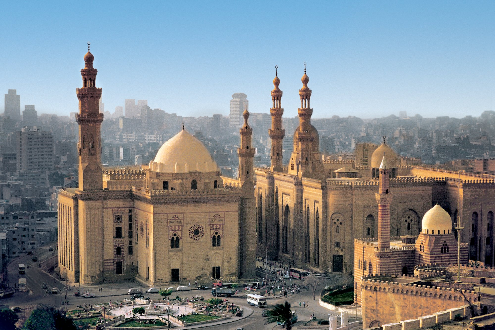 1869-1911, Cairo, Egypt --- The 14th-century Mosque of Sultan Hasan (l), next to the Mosque of al-Rifa'i (r), which was begun in the 19th century. --- Image by © Royalty-Free/Corbis