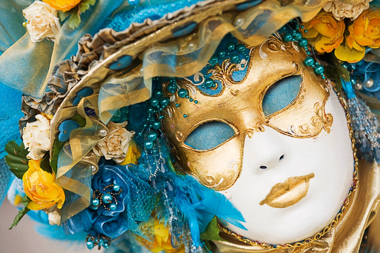 Portrait of beautiful Ornate female Mask at carnival in Venice