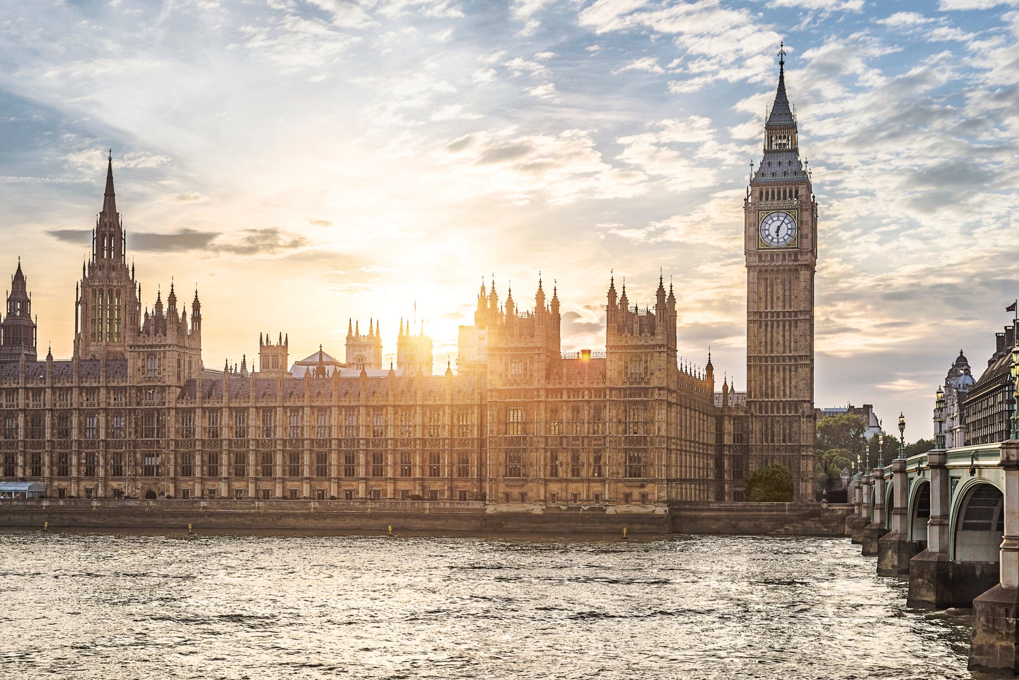 Sun setting over Houses of Parliament, London, United Kingdom