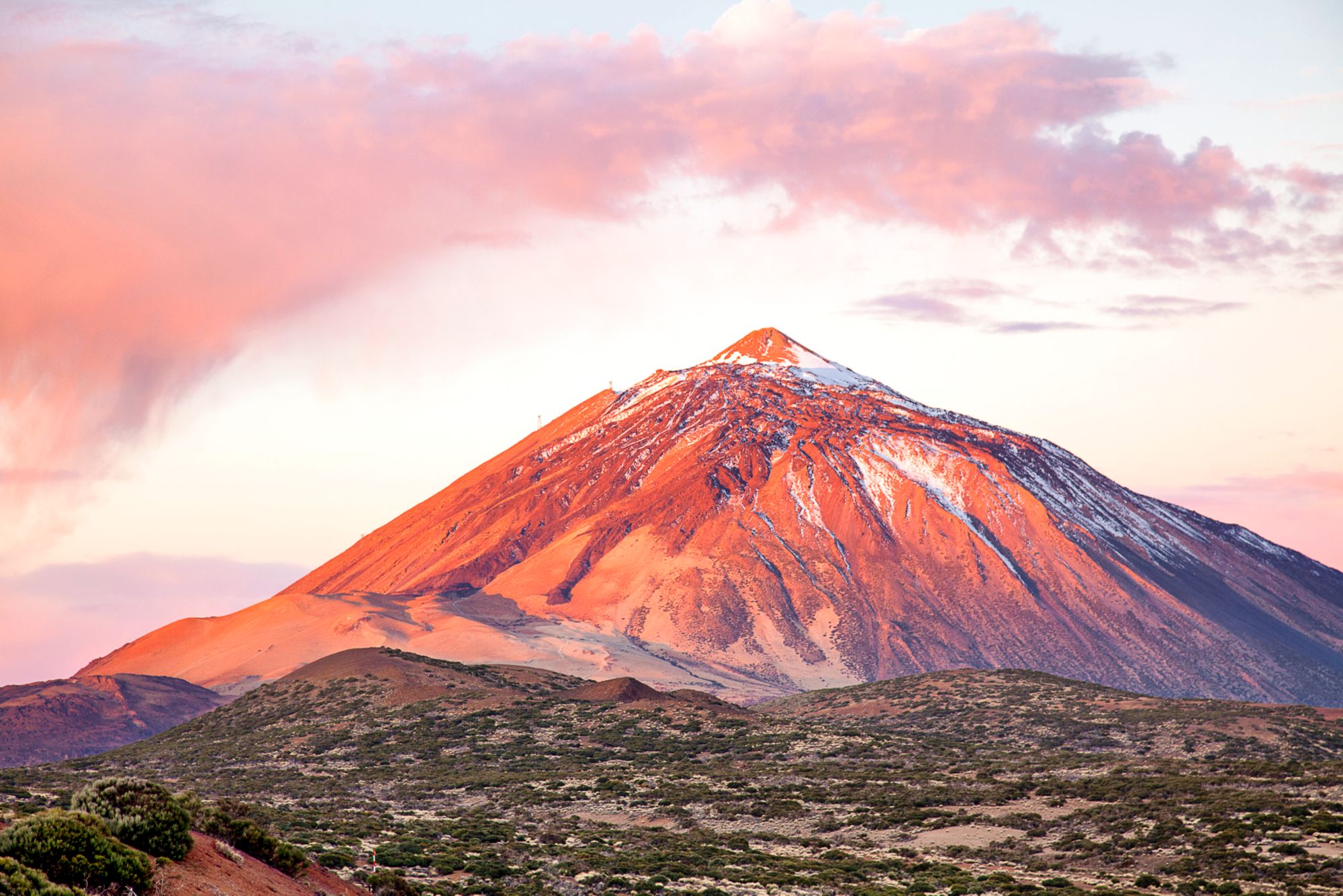 Sunrise over Teide National Park with a cloud on top of Teide volcano, Teide National Park.