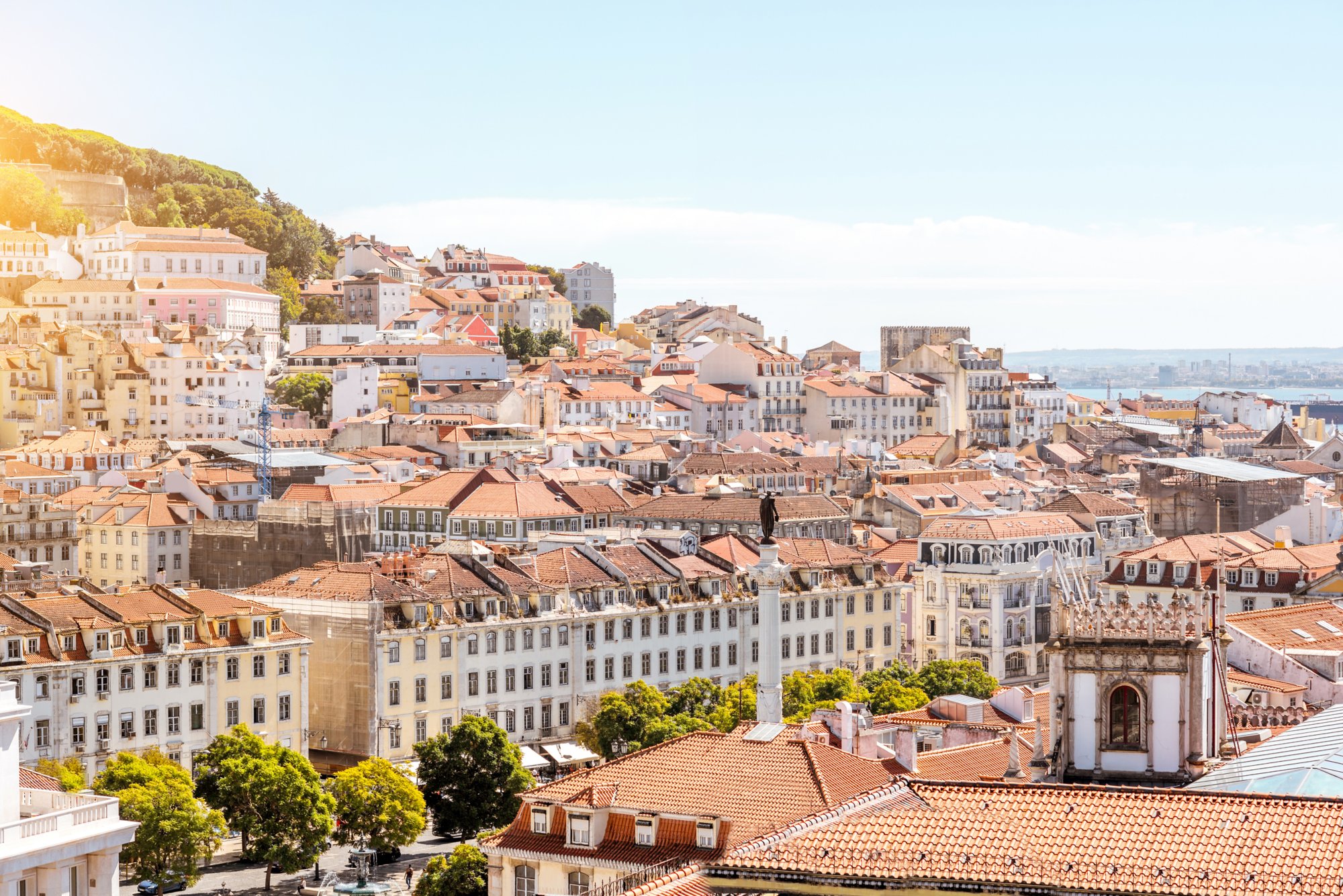 Cityscape view on the old town with Pedro IV statue in Lisbon city, Portugal