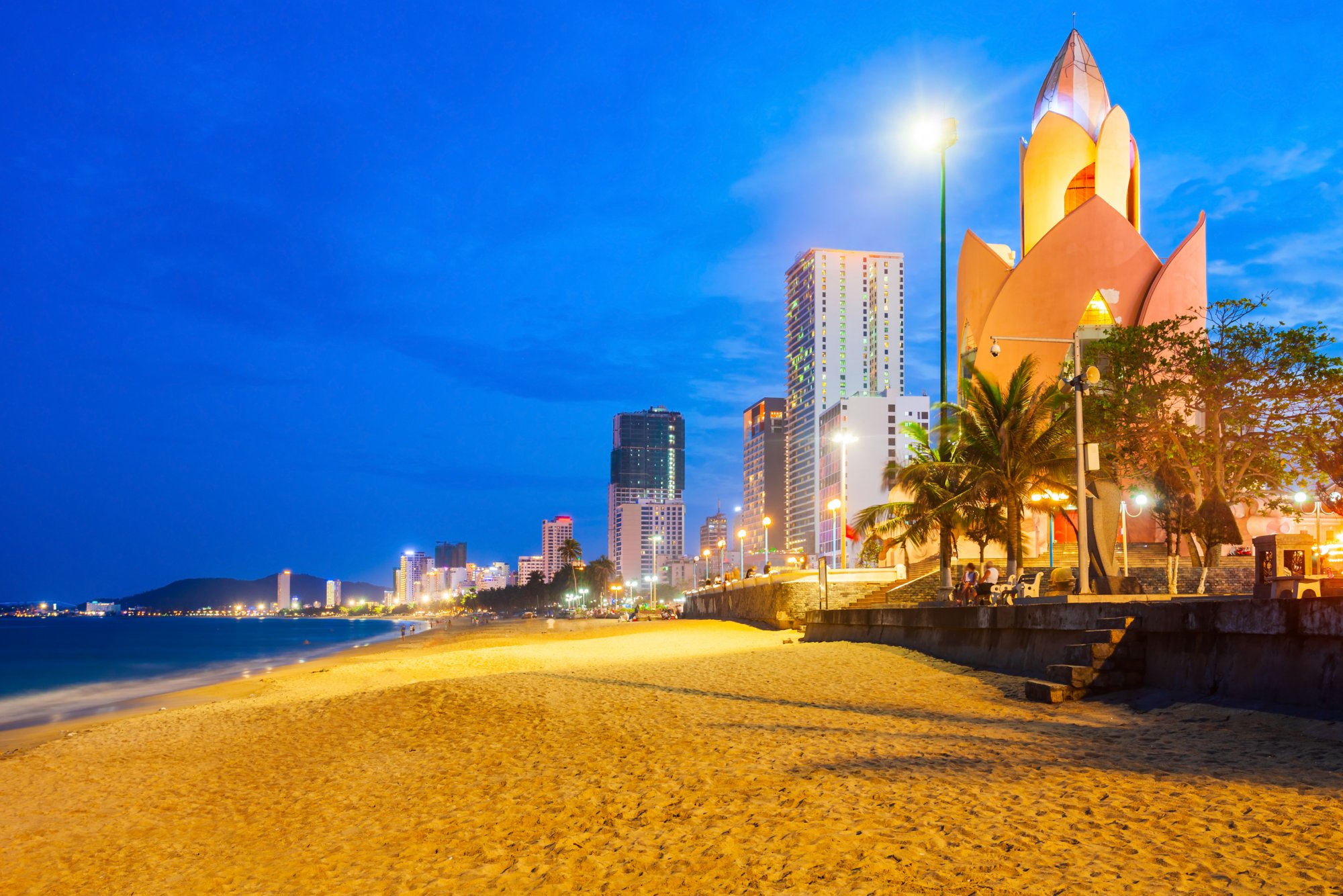 Nha Trang city beach at the sunset, a public beach located in the centre of Nha Trang in Vietnam