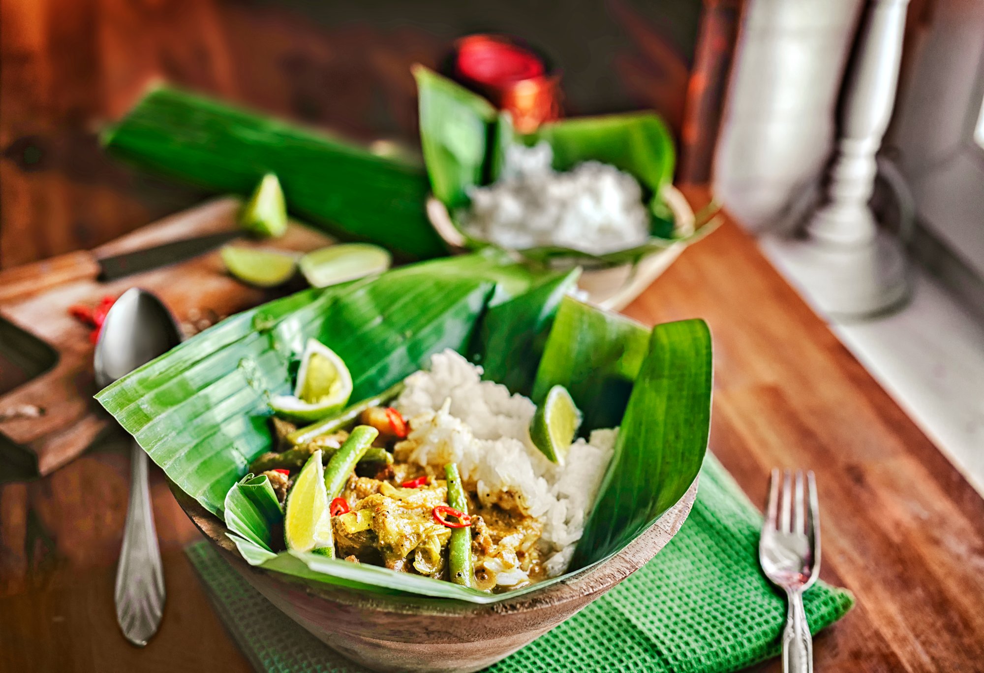 Balinese Pork Curry Dish with Jasmine Rice Served on Banana Leave