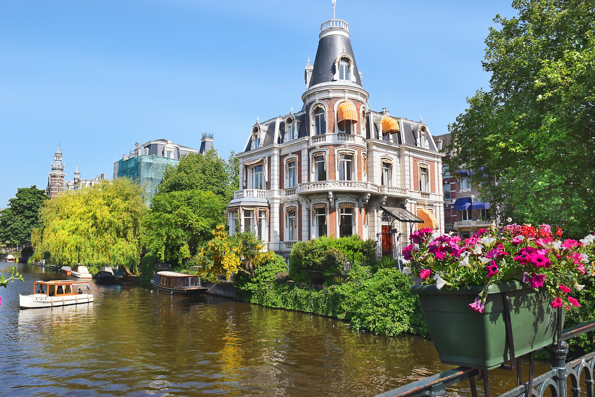 beautiful mansion of victorian era on a Singelgracht canal near the Rijksmuseum in Amsterdam, Netherlands