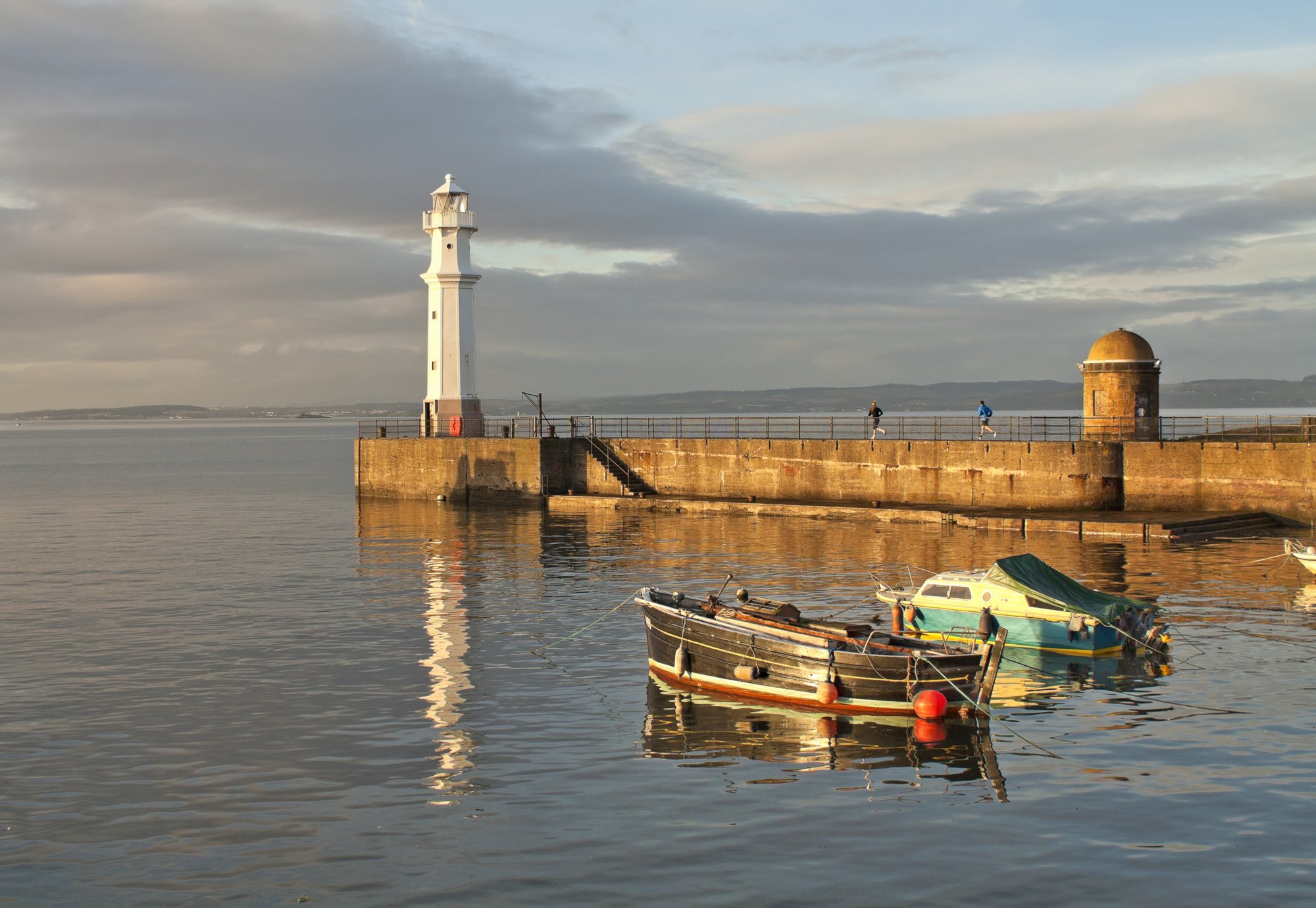 A lighthouse built in1869  at the harbour entrance in Newhaven district of Edinburgh, Scotland, is a local landmark