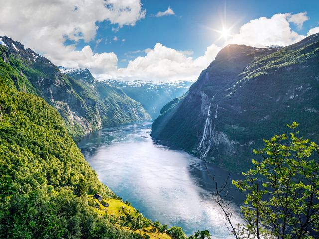 Geirangerfjord fjord. View of the old mountain farm and the Seven Sisters waterfall, Norway. Popular tourist attraction near the city of Geiranger