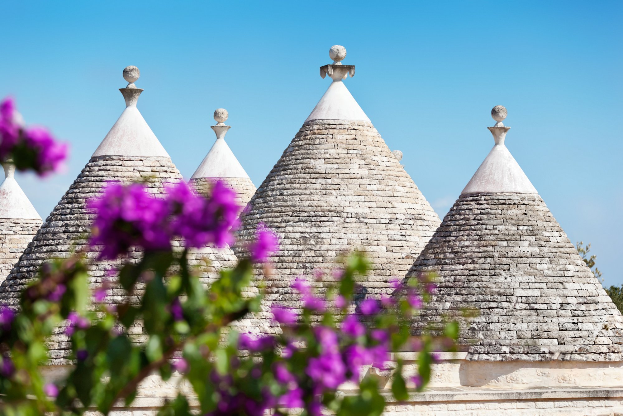 A limestone trullo in Puglia, in the Itrea Valley, in Southern Italy, the only place that these dry stone buildings with their conical roofs can be found. Mostly built as field or agricultural buildings, many became homes and are now sought after for refurbishment and holiday homes.