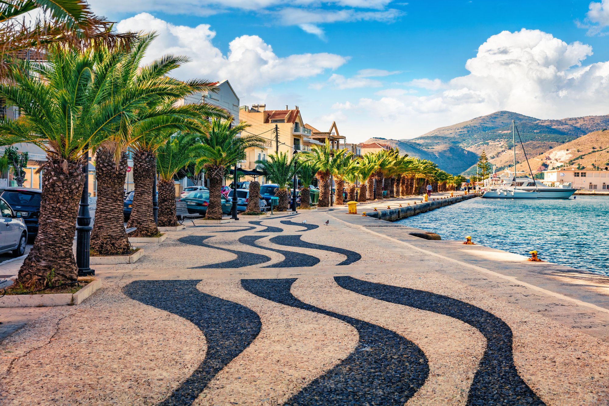 Attractive spring cityscape of Argostoli port. Romantic morning scene of Kefalonia island, Greece, Europe. Beautiful seascape of Ionian Sea. Traveling concept background.