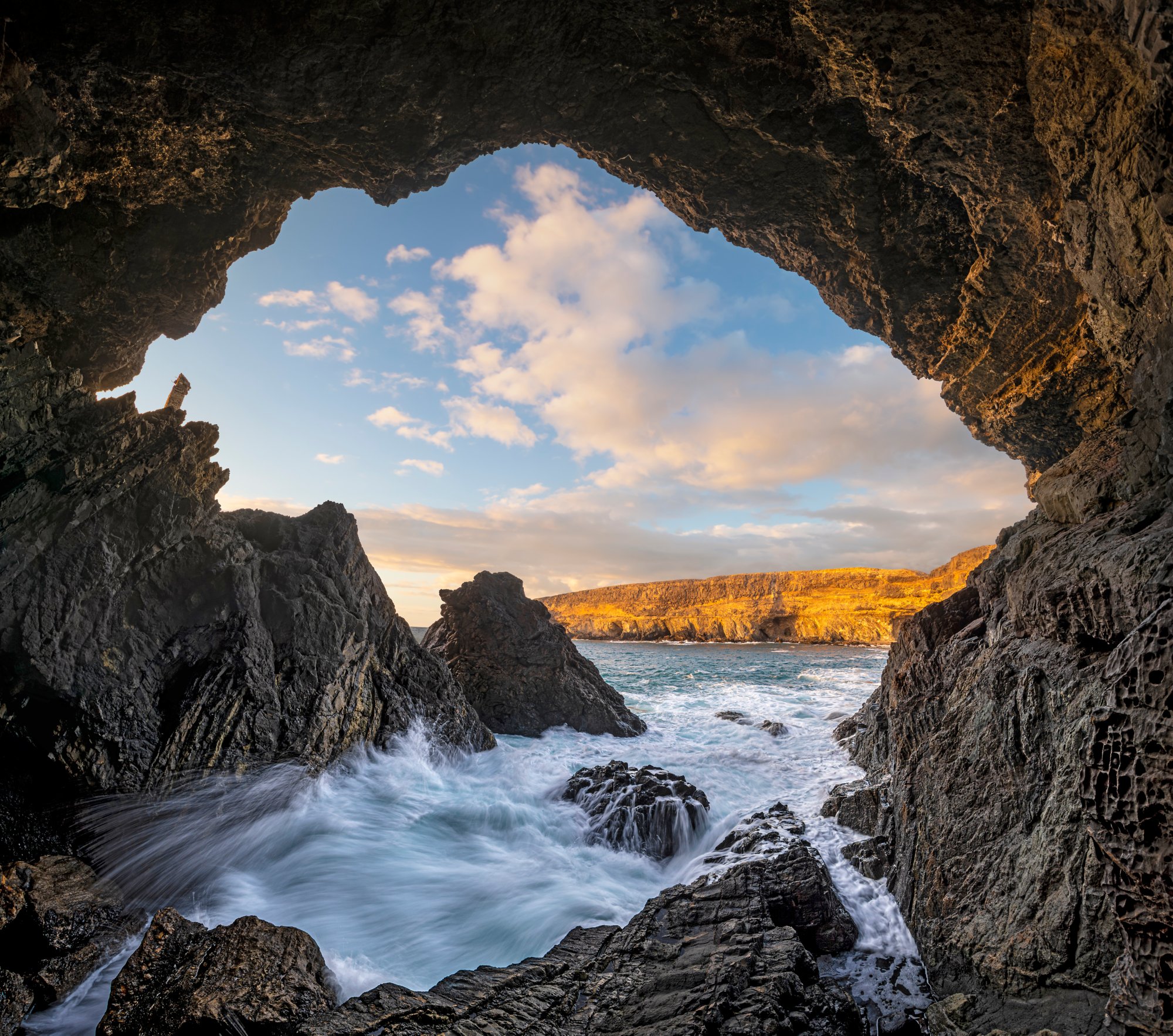 Caves at the ocean cliff in Monumento Natural de las Cuevas de Ajuy National Park